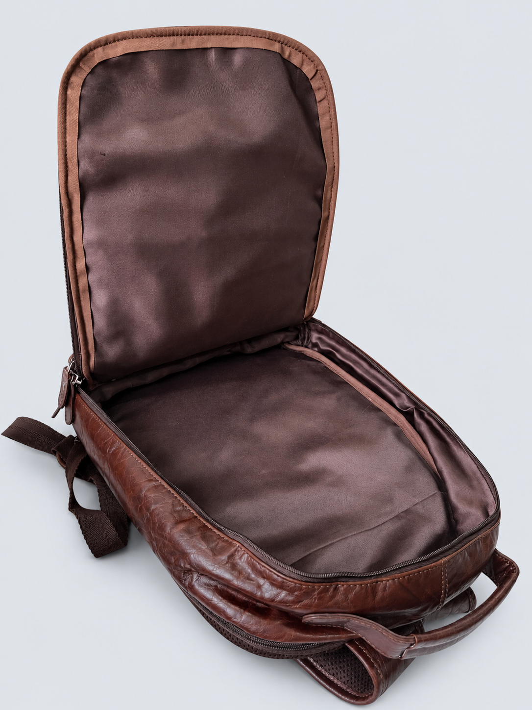 LEATHER BACKPACK WITH TRIPLE COMPARTMENT