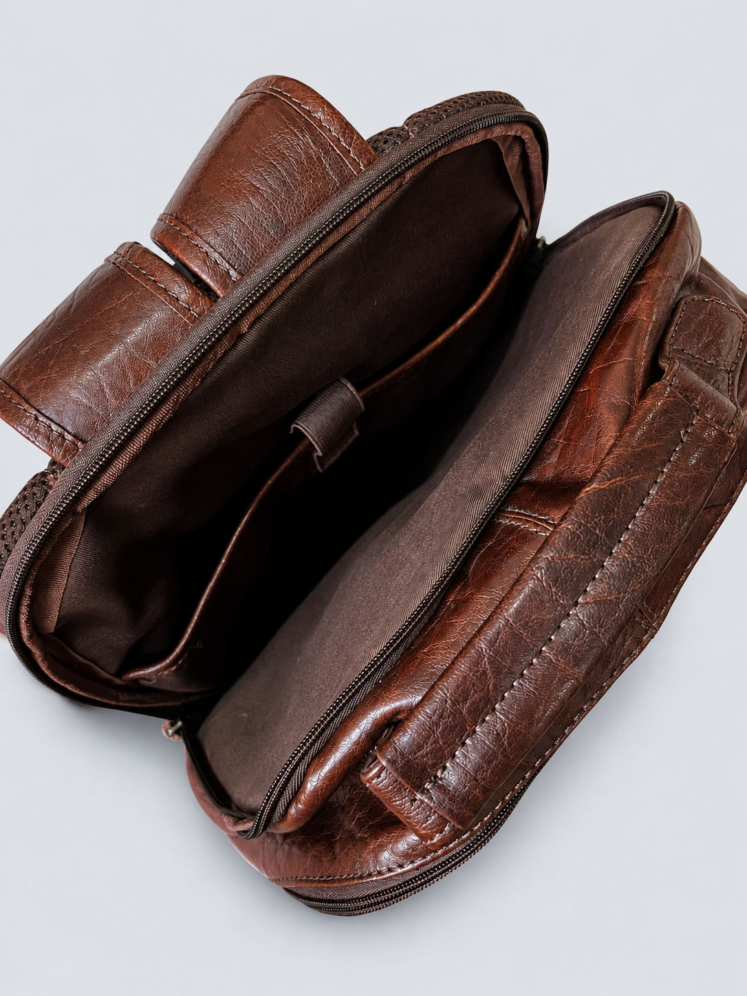 LEATHER BACKPACK WITH TRIPLE COMPARTMENT