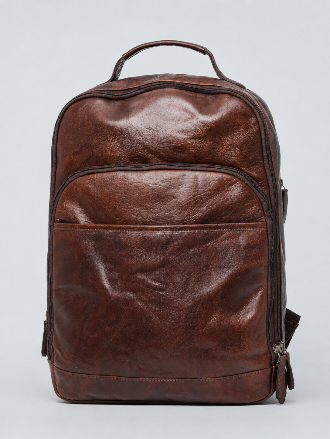 LEATHER BACKPACK WITH TRIPLE COMPARTMENT